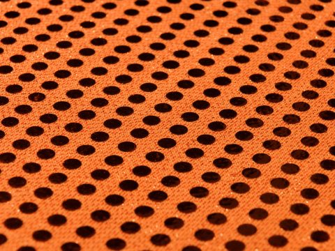 Gros plan sur un tissu à motif polka dots