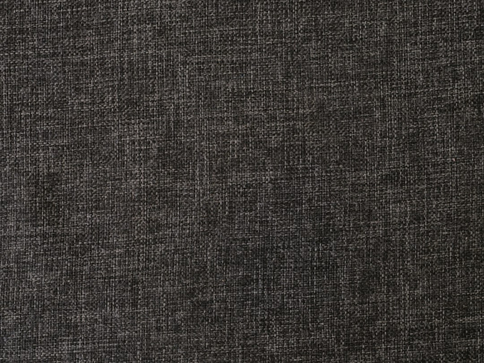 Gros plan sur la texture d'un tissu de manteau, laine et fils visibles